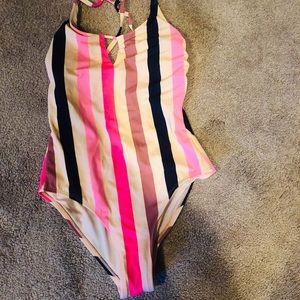 Young misses one piece swim suit